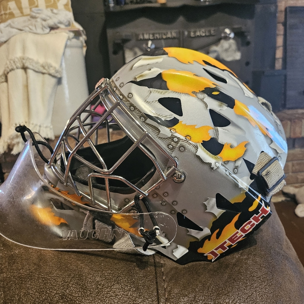 Youth hockey goalie helmet tier chin protector